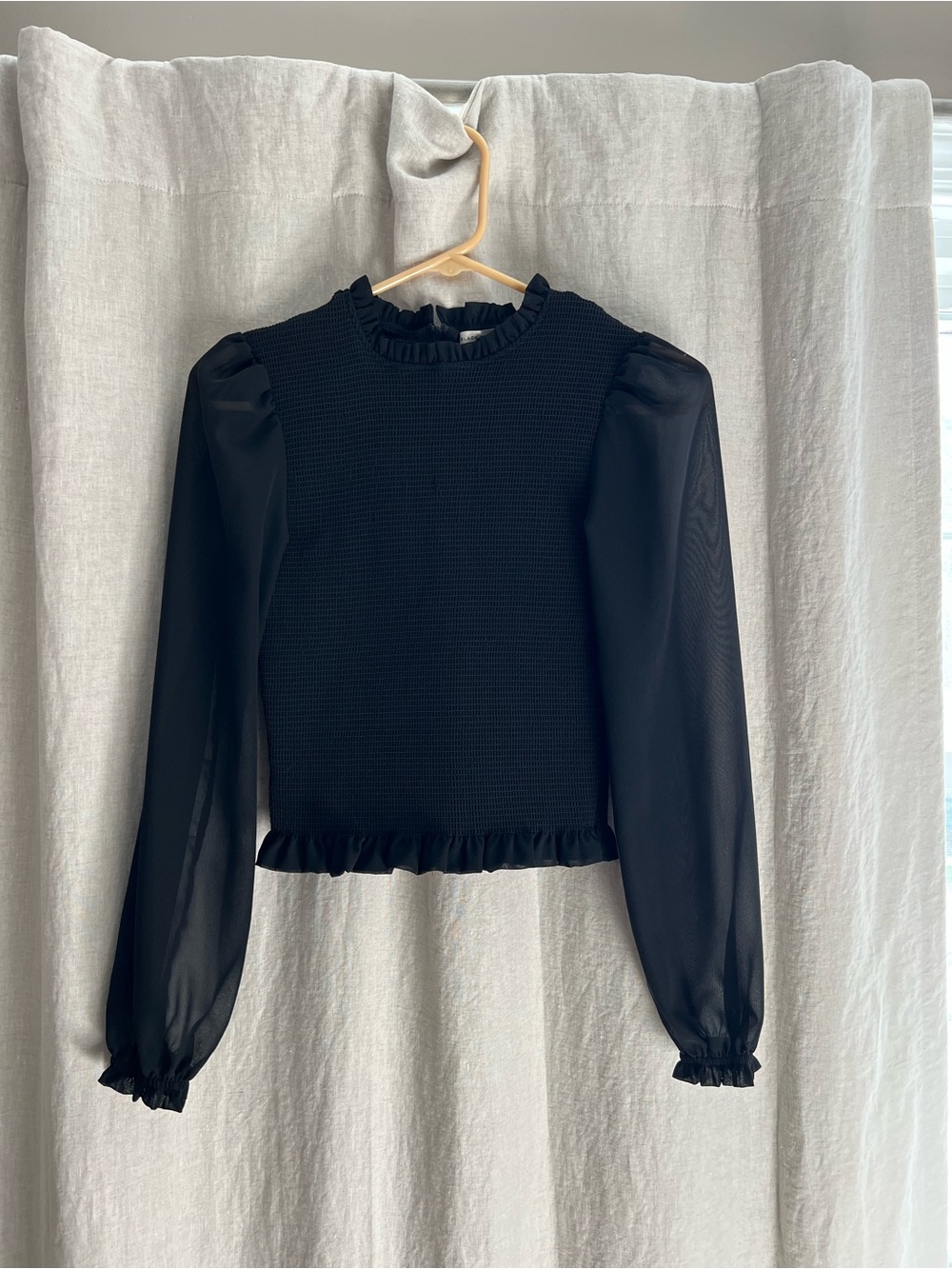 Black Tape_ Sheer-Sleeve Ruffle-Neck Top in Black
